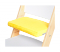 Žlutý podsedák na bílé rostoucí židli Sedees