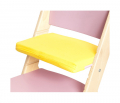 Žlutý podsedák na růžové rostoucí židli Sedees