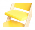 Žlutý podsedák na žluté rostoucí židli Sedees
