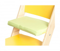 Zelený podsedák na žluté rostoucí židli Sedees